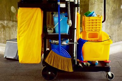 a comprehensive cleaning trolley complete with cleaning compounds and equipment
